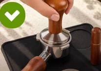 Tamping evenly on the mat, shown as the fix